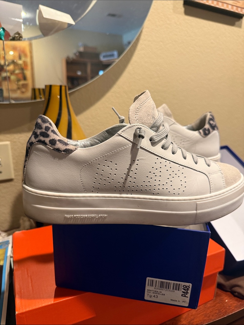 White Low-Top Sneakers with Leopard Heel Accent